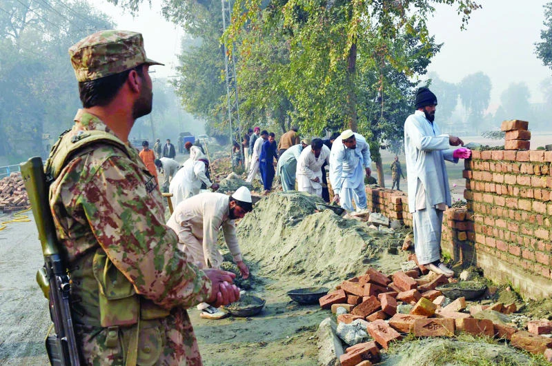 Pakistanis rally to fight terror at stricken school