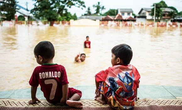 Floods in Malaysia kill dozens