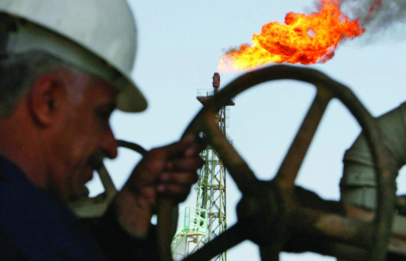 Oil price plunges to 5-1/2-year low below $57 on supply glut