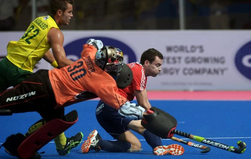 England stuns Australia in Champions Trophy opener
