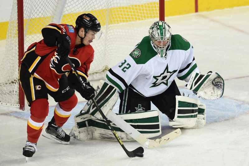 Benn leads Stars to win over Flames