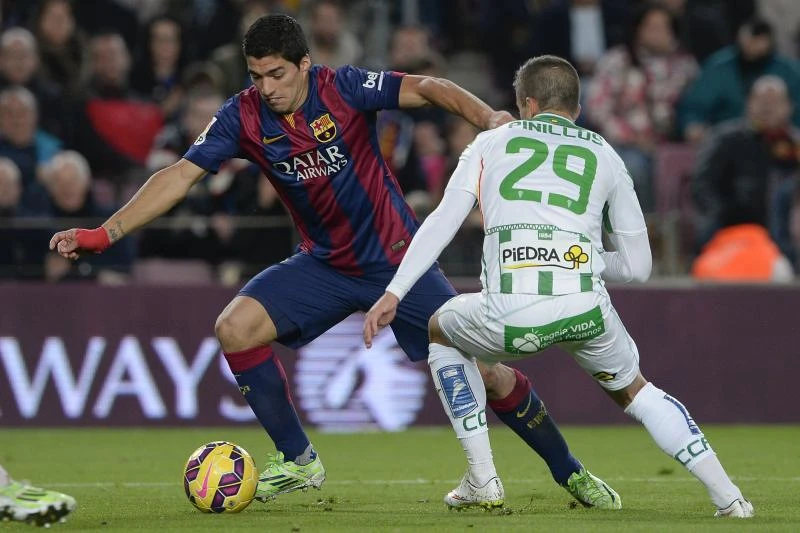 Suarez opens league account, Messi at double