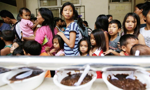 Storm churns toward Manila after killing 23