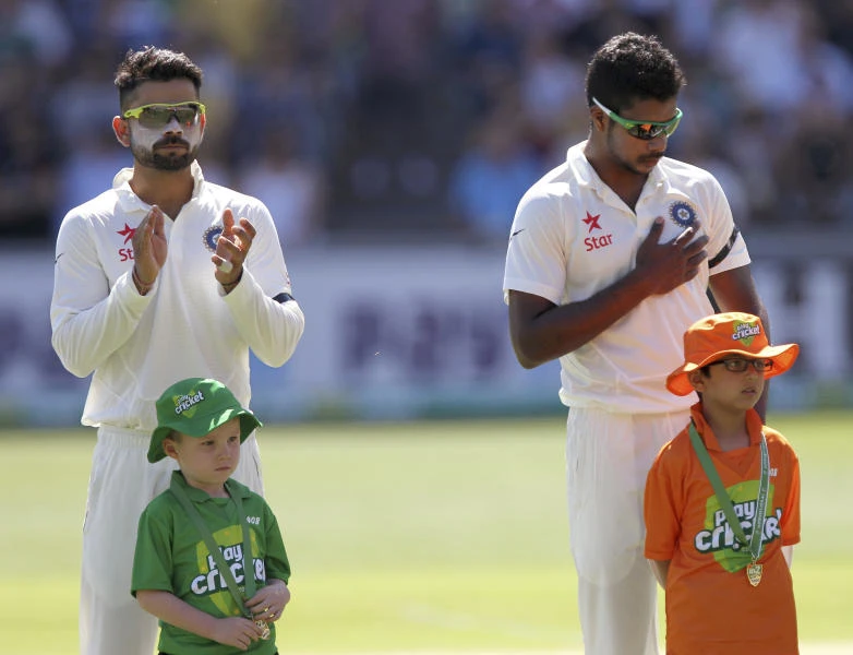 Cricket fans, players pay poignant tribute to fallen Hughes