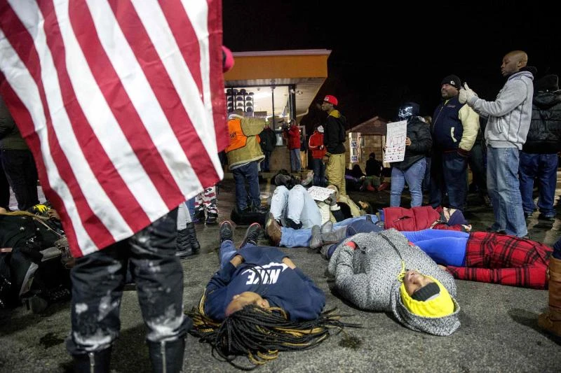 Arrests in protest over police shooting of black teen