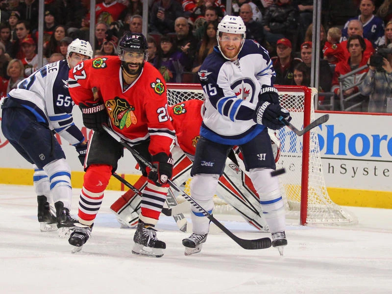 Jets ease past Blackhawks