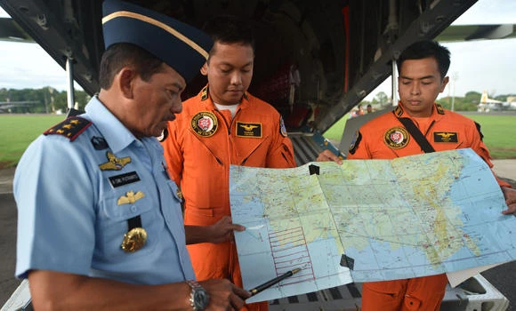 Bodies, debris from missing AirAsia plane pulled from sea