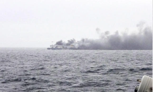 Ferry burns in Adriatic; rough seas slows rescue
