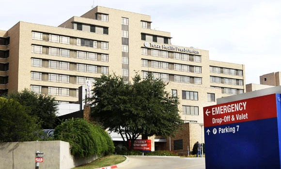 US health care worker under watch