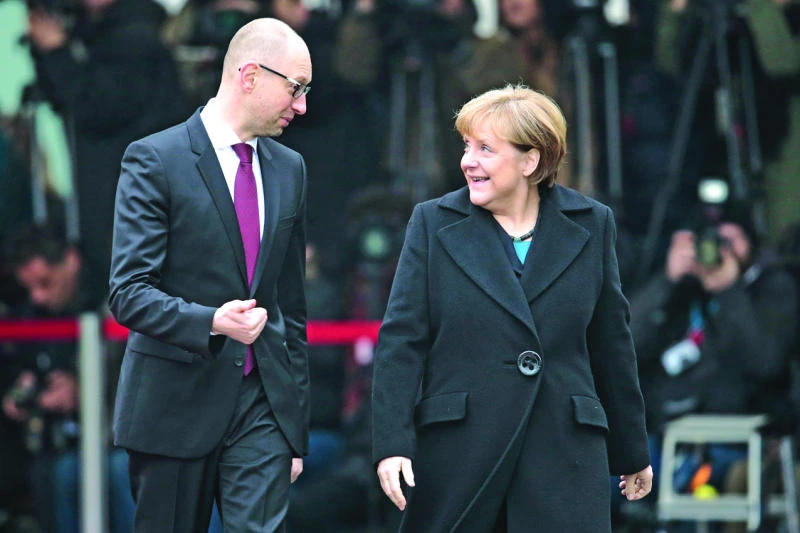 Sanctions will end if Russia honors Minsk accord, says Merkel