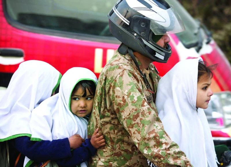 Defying terror, students return to Peshawar school