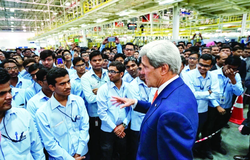 Kerry tours new Ford plant in western India