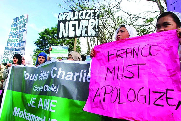 Respect religions, marchers in Philippines tell Charlie Hebdo