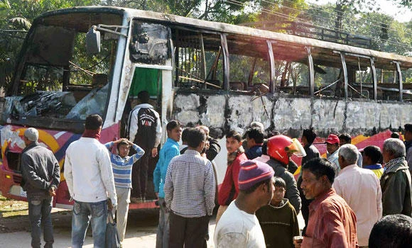 Protesters torch bus in Bangladesh unrest; 4 dead