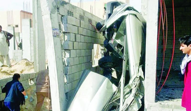 Van crashes into building