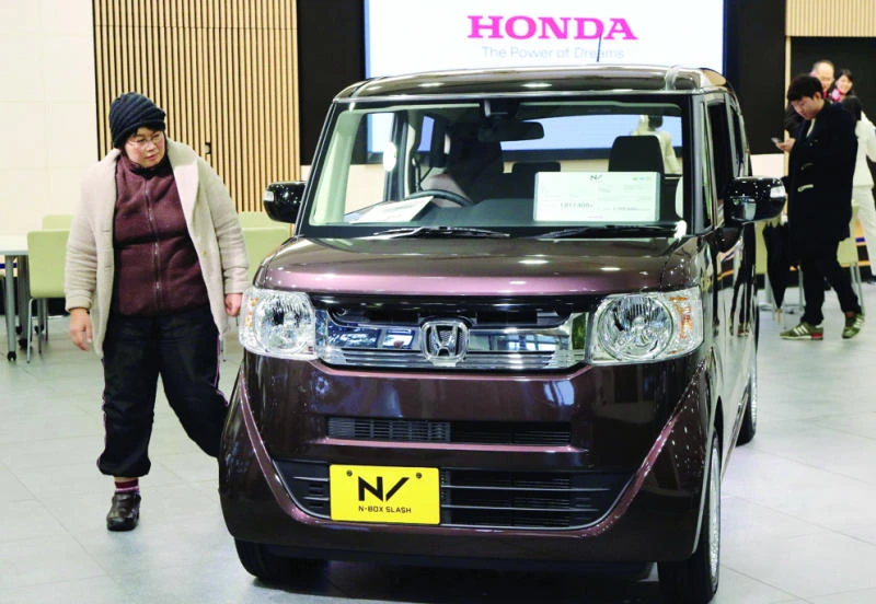 Honda cuts profit forecast as airbag recall dents bottom line