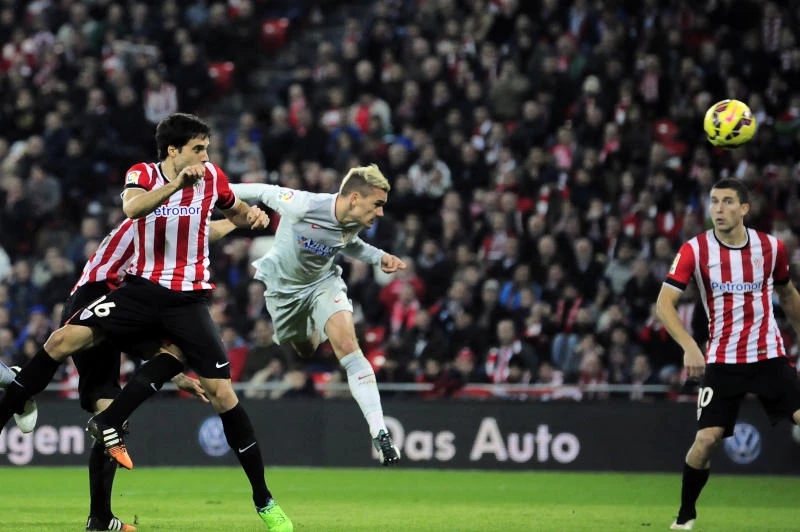 Griezmann double keeps Atletico on Real’s shoulders