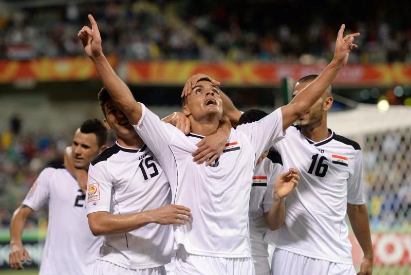 Japan, Iraq storm into quarters