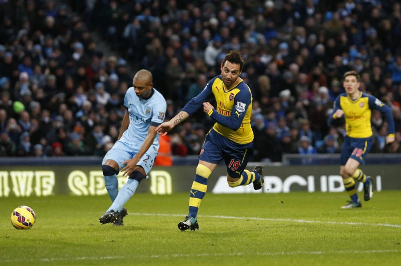 Cazorla stars as Arsenal stuns Man City
