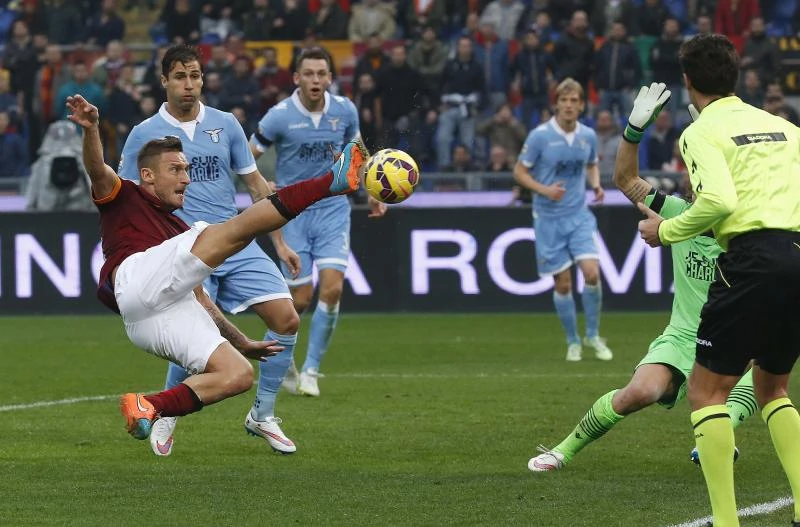 Totti brace saves Roma blushes