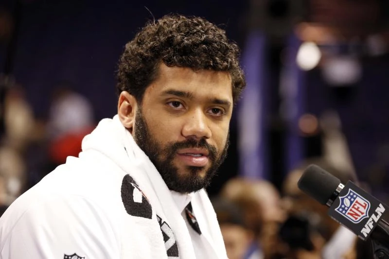 Wilson recalls watching as a kid while Brady won Super Bowls