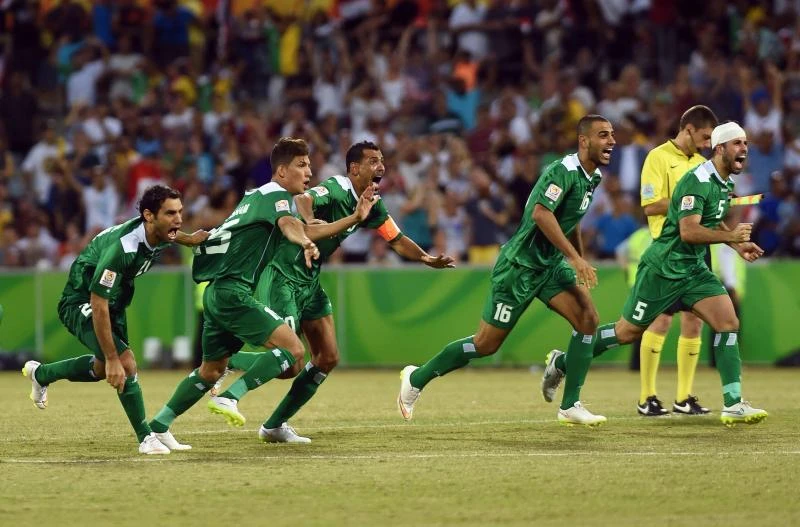 Iraq, UAE triumph in night of upsets