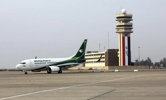 Airlines halt Baghdad flights after gunfire hits plane