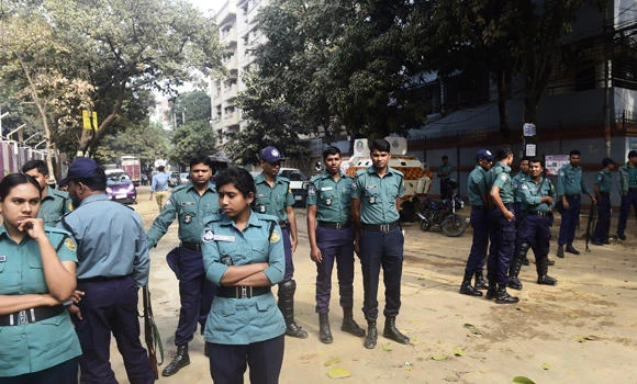 Bangladesh bans protests, locks opposition leader in office