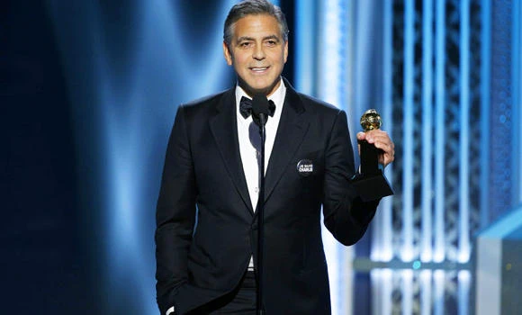 With humor and humility, Clooney accepts lifetime Golden Globe