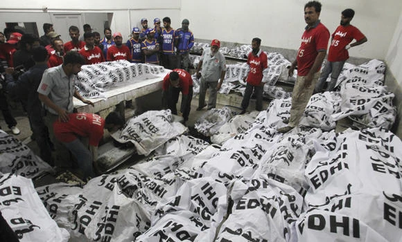 Bus crashes into oil tanker in Pakistan, killing 57