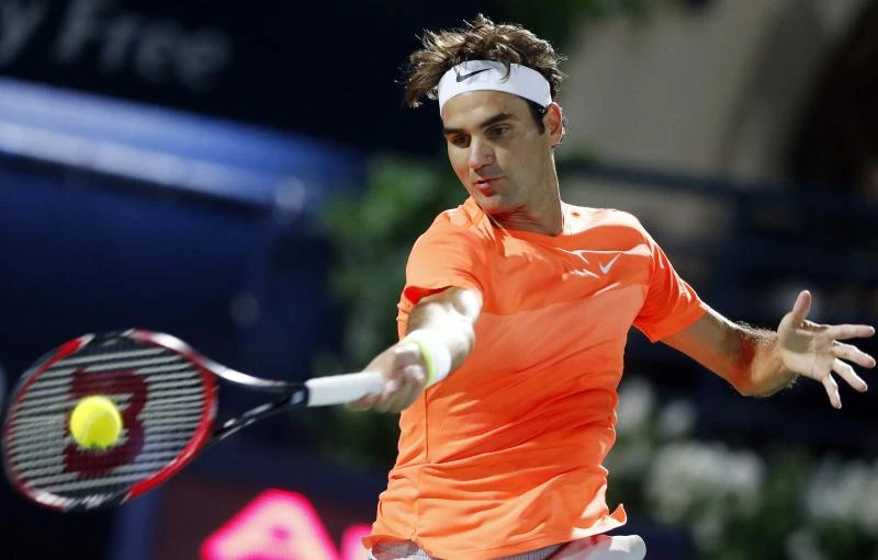 Federer clears first hurdle in Dubai title defense