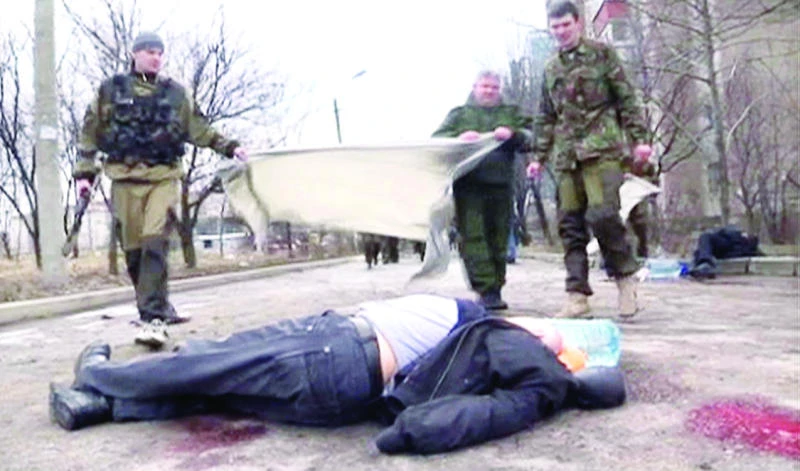 Hospital shelled in east Ukraine as calls mount for truce