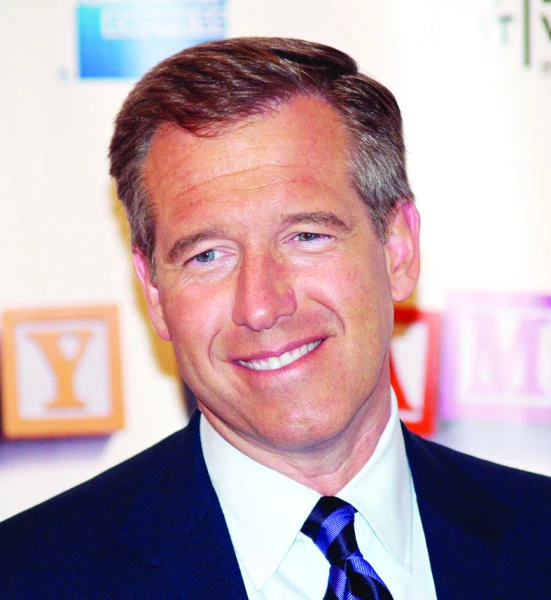 News anchor recants on coming under fire in Iraq