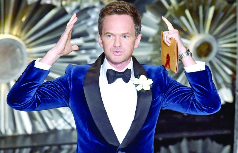 Oscars TV ratings slump, critics slam presenter