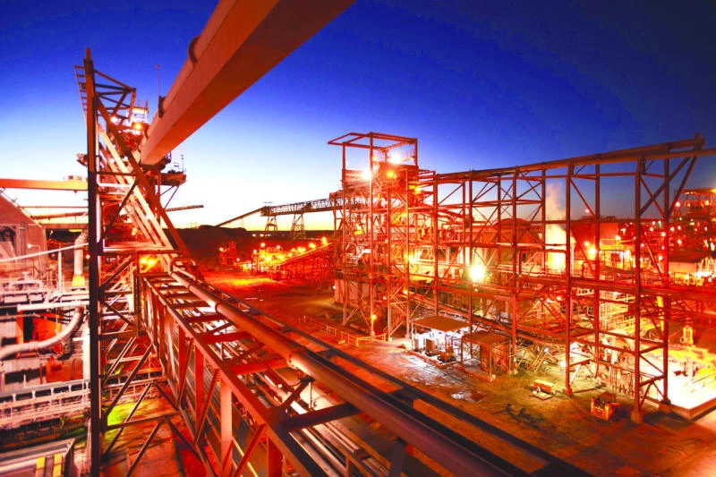 Mining giant BHP Billiton H1 net profit almost halves