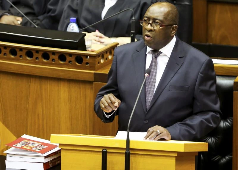S. Africa hikes taxes, scales back spending plans