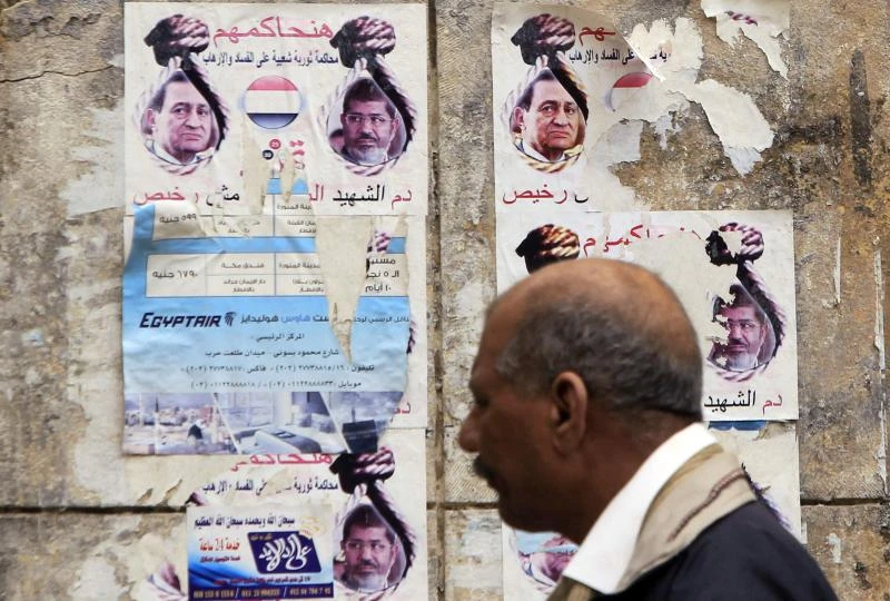 Egypt refers Mursi to military tribunal