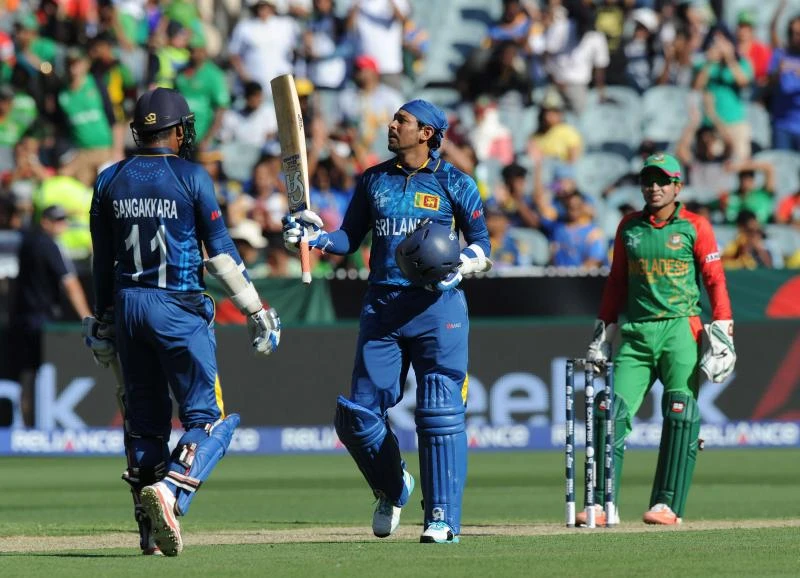 Sangakkara, Dilshan tons flatten sloppy Bangladesh
