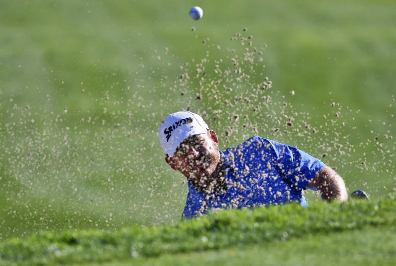 Holmes, English share lead at Torrey Pines