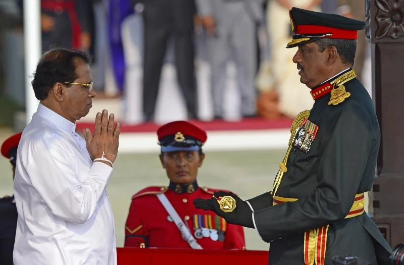 Sri Lanka hands back army occupied land in ex-war zone