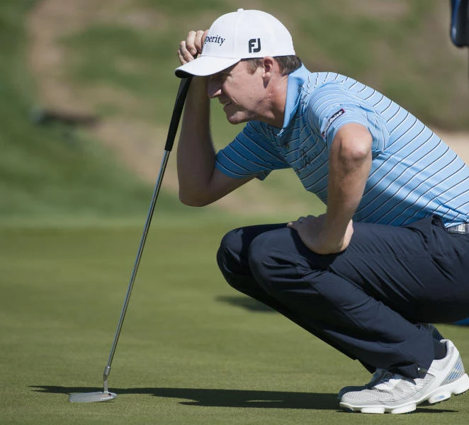 Walker leads by 4 at windy Texas Open