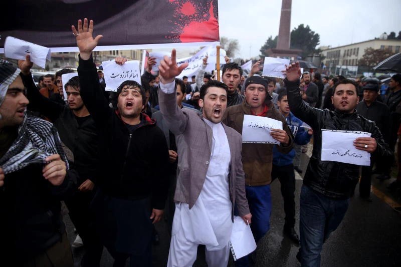 Afghans protest lynching of woman for allegedly burning Qur'an