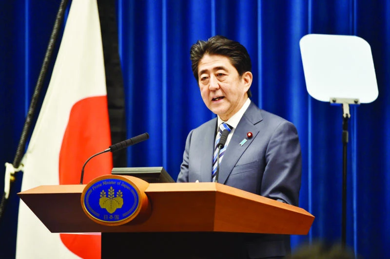 Japan's lower house approves record $793bn budget