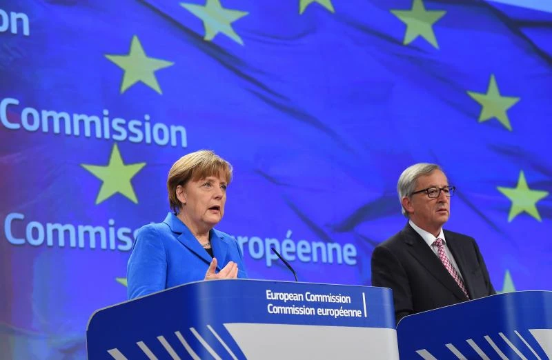 Merkel warns Russia of more sanctions