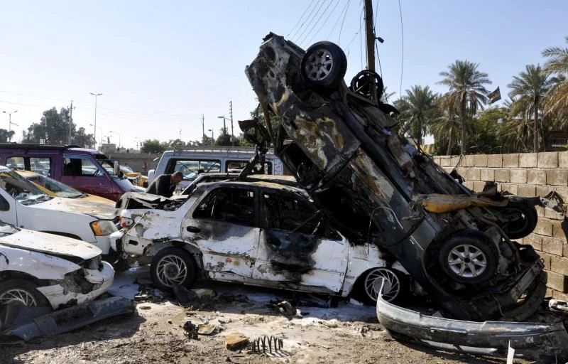 Car bombs kill
27 in Baghdad