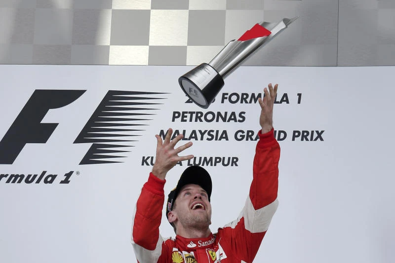 Vettel tops Malaysian GP to end Mercedes streak