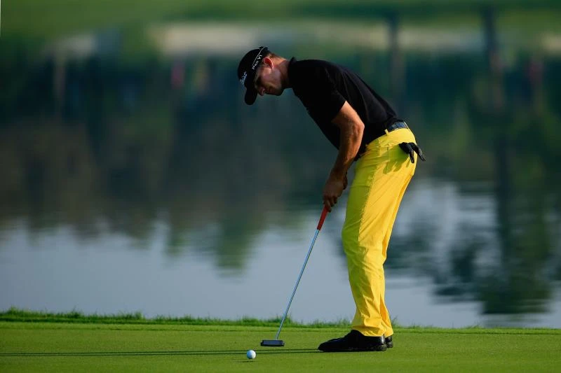 McIlroy makes solid start but Hoffmann grabs lead