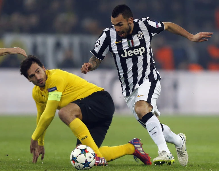 Barca through; Tevez double gives Juve last eight spot