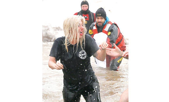 Gaga, Vaughn take charity polar plunge