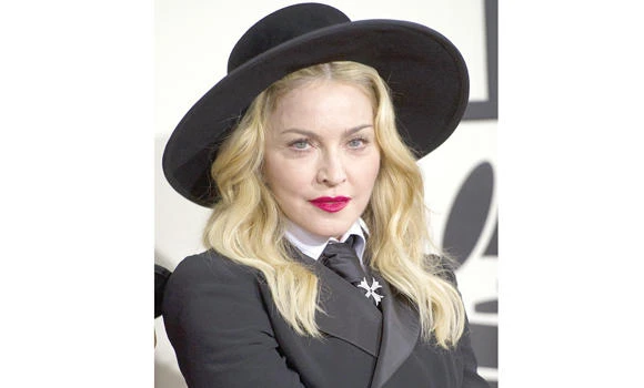 Madonna plans global tour for new album